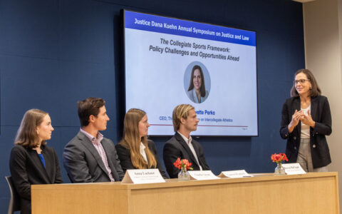 Justice Dana Kuehn Symposium panel discussion on collegiate sports policy.