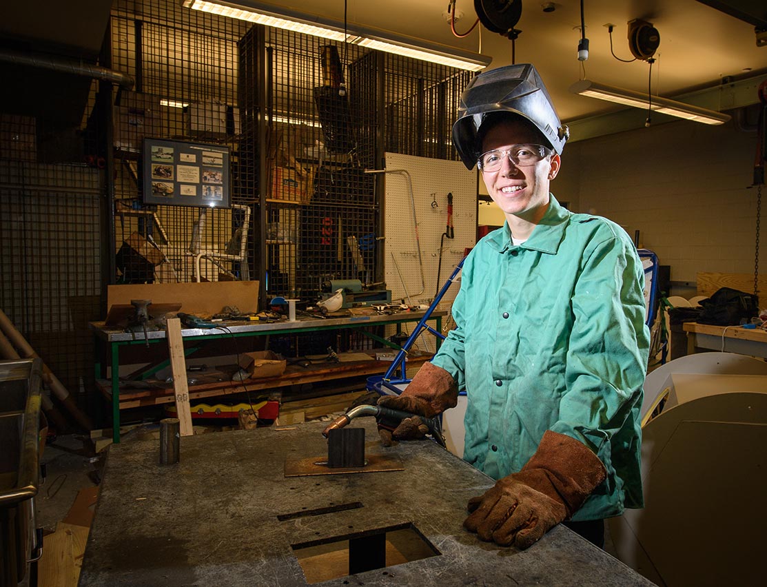 student working in a shop